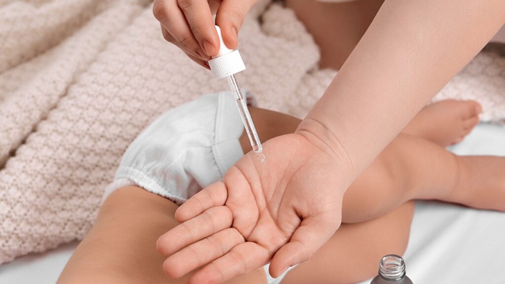 folded diaper technique, umbilical granuloma treatment, do not use essential oils for newborn cord care