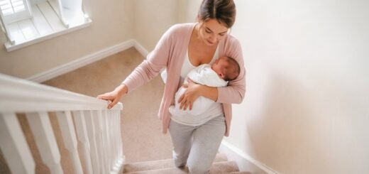 mom after birth climbing stairs illustrating postpartum stair safety tips