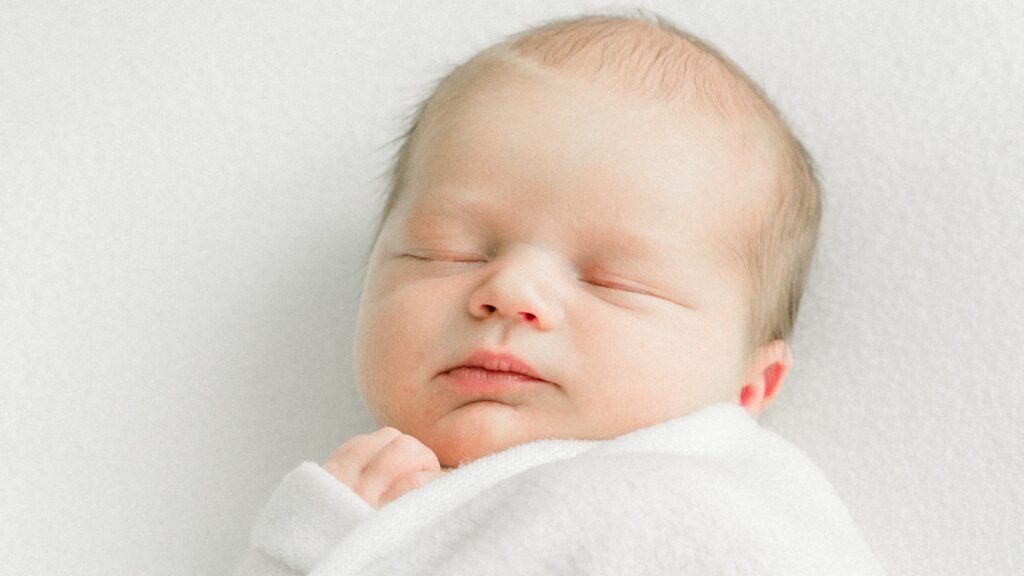 Discover when to stop swaddling as baby reaches this milestone, Understand how swaddling relates to SIDS prevention